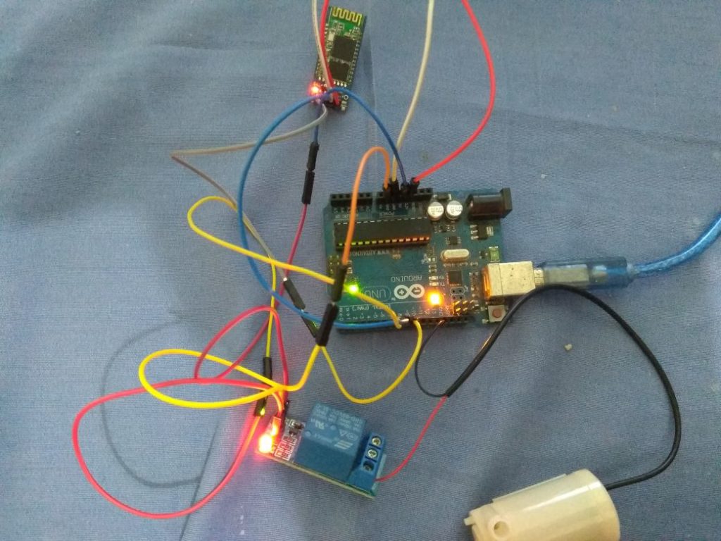Esquema de montagem do projeto como módulo Bluetooth HC-06 e módulo relé no Arduino Uno na prática